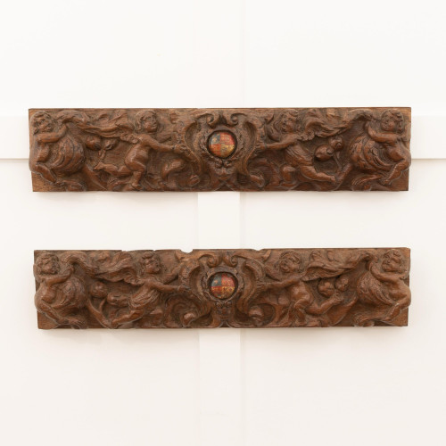 A pair of 17th century carved panels, circa 1600-30