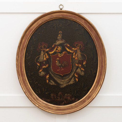 A Victorian painted oak heraldic coaching panel, circa 1840