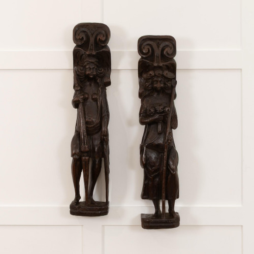 A pair of early 17th century carved oak figures, Dutch/Flemish, circa 1600-20