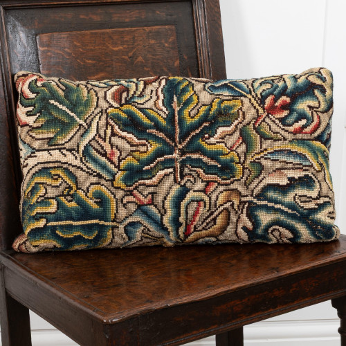 A striking early 18th century needlework panel, circa 1700-20