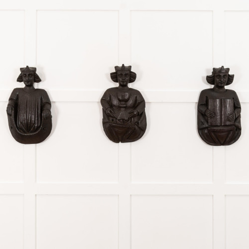 A marvellous and rare trio of 15th century oak roof/corbel angels, English, East Anglican or possibly West Country, circa 1450-1500