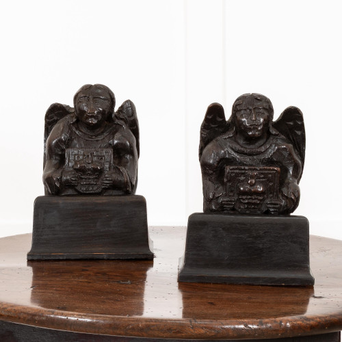 A rare pair of 15th century carved oak angel corbels, English, circa 1490