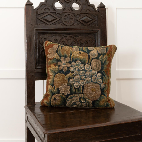 A cushion of 17th century Flemish tapestry