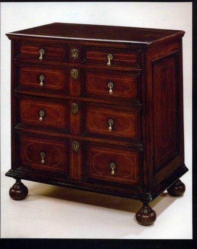 A fine William & Mary walnut chest of drawers, with a secret drawer, and box wood stringing