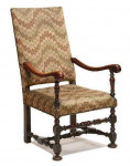 A late-17th century, French, walnut armchair, re-upholstered in 19th century bargello
