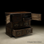 An exceptionally rare, mid-late-17th century, oak, bone and ebonized chest of drawers with enclosed upper section