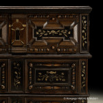 An exceptionally rare, mid-late-17th century, oak, bone and ebonized chest of drawers with enclosed upper section