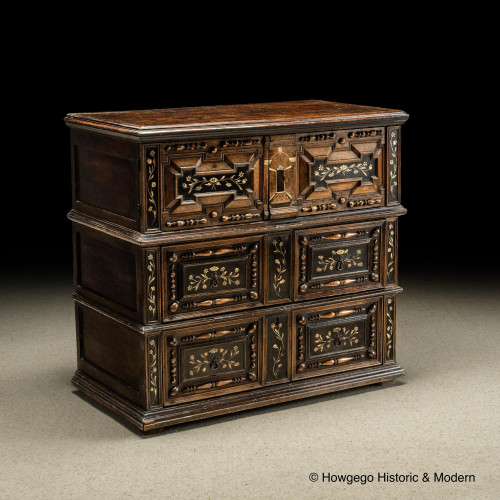 An exceptionally rare, mid-late-17th century, oak, bone and ebonized chest of drawers with enclosed upper section
