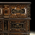 An exceptionally rare, mid-late-17th century, oak, bone and ebonized chest of drawers with enclosed upper section