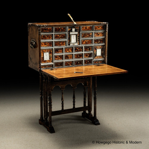 AN EXCEPTIONAL SPANISH COLONIAL VARGUEÑO OR BARGUEÑO, tortoiseshell, ebony, engraved ivory and Colonial hardwood, Spain, late 16th / early 17th century (cabinet)