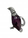 Victorian style silver plated claret jug in the form of a standing eagle (purple / amethyst)