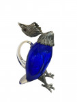 Victorian style silver plated claret jug in the form of a standing eagle (blue glass)
