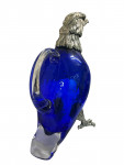 Victorian style silver plated claret jug in the form of a standing eagle (blue glass)