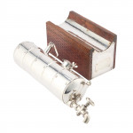 A CONTINENTAL SILVER NOVELTY DECANTER
CIRCA 1900 IN THE FORM OF A STEAM ENGINE