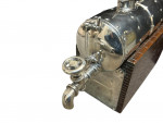A CONTINENTAL SILVER NOVELTY DECANTER
CIRCA 1900 IN THE FORM OF A STEAM ENGINE BOILER
