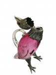 Victorian style silver plated claret jug in the form of a standing eagle (red / cranberry glass)