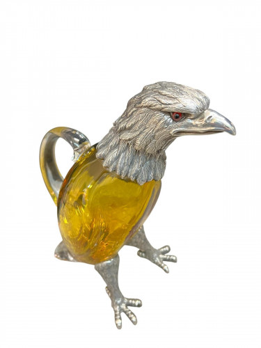 Victorian style silver plated claret jug in the form of a standing eagle (gold / yellow glass)