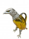 Victorian style silver plated claret jug in the form of a standing eagle (gold / yellow glass)