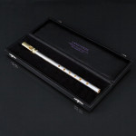 Handmade silver penny whistle