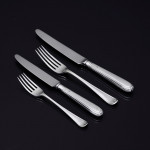 Set of hand-forged George IV Old English Thread silver cutlery for 12