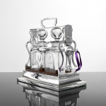 Two-bottle Edwardian silver tantalus set
