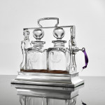 Two-bottle Edwardian silver tantalus set