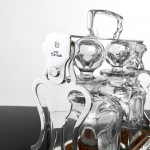 Two-bottle Edwardian silver tantalus set