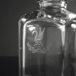 Two-bottle Edwardian silver tantalus set