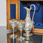 Excellent silver wine jug & matching goblets in oak chest