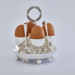 Four-cup Victorian silver egg cruet set