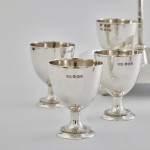 Four-cup Victorian silver egg cruet set