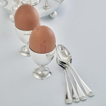 Four-cup Victorian silver egg cruet set