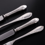 Extensive set of one-date-&-maker Laurel & Ribbon pattern silver cutlery for 12