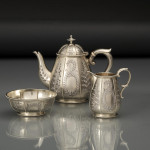 Exceptional quality three-piece Victorian parcel-gilt tea set