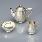 Exceptional quality three-piece Victorian parcel-gilt tea set