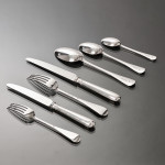 Set of Victorian hand-forged Old English silver cutlery for 12 in a canteen