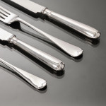 Set of Victorian hand-forged Old English silver cutlery for 12 in a canteen