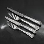 Set of antique hand-forged Kings Husk pattern silver cutlery for 12