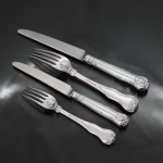 Set of antique hand-forged Kings Husk pattern silver cutlery for 12