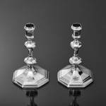 Pair of Queen Anne cast Britannia silver candlesticks