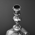 Pair of Queen Anne cast Britannia silver candlesticks