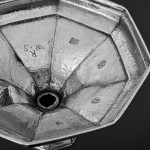 Pair of Queen Anne cast Britannia silver candlesticks