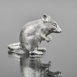 Small sitting silver mouse