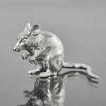 Small sitting silver mouse