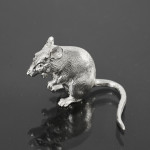 Small sitting silver mouse
