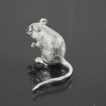 Small sitting silver mouse