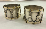 Pair of Edwardian silver napkin rings modelled as drums
