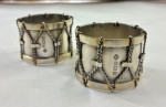 Pair of Edwardian silver napkin rings modelled as drums
