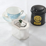 Dual Art Deco silver tea caddy with faux jade finial