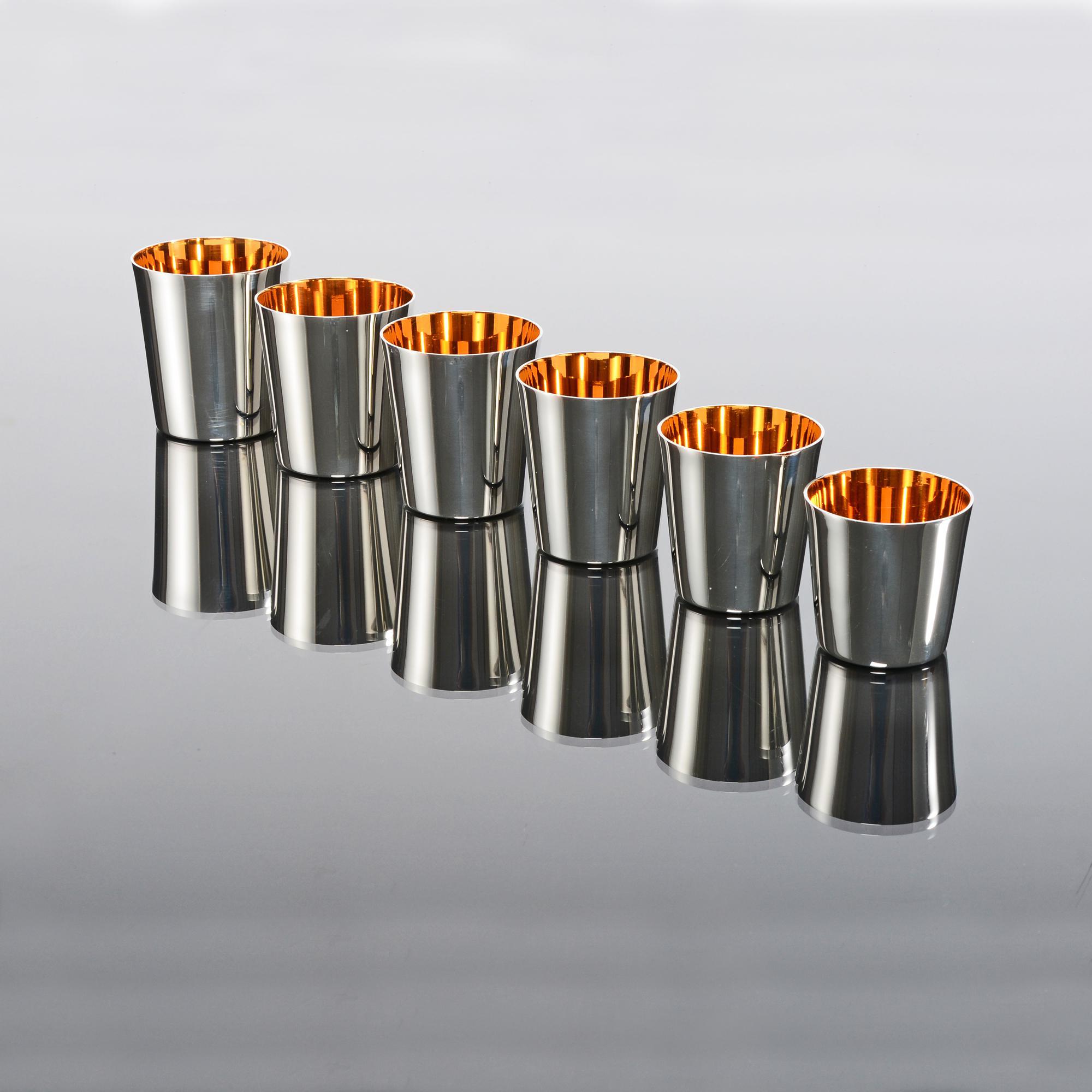 Set of six silver stacking beakers or stirrup cups